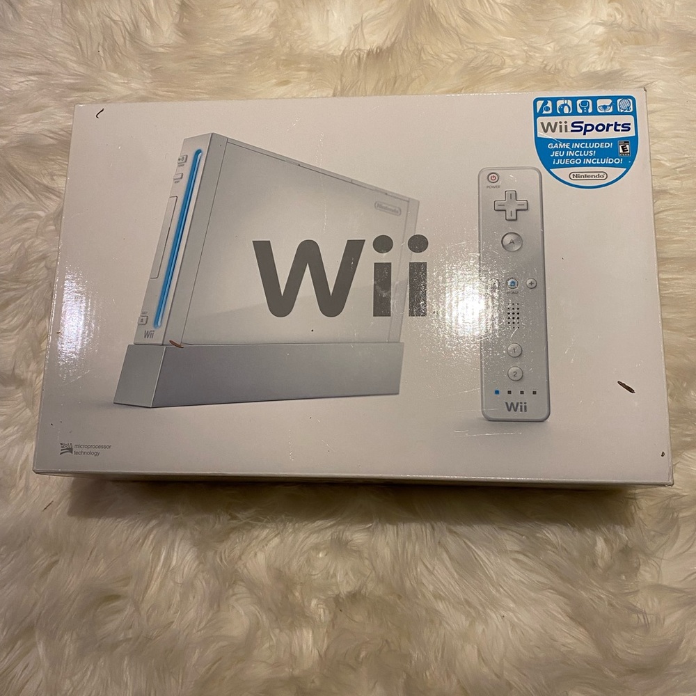 Nintendo Wii with 6 games included and accessories